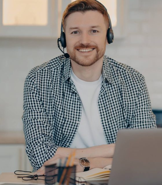handsome-glad-man-customer-support-manager-gives-a-2022-01-27-18-15-48-utc-e1660552801998.jpg