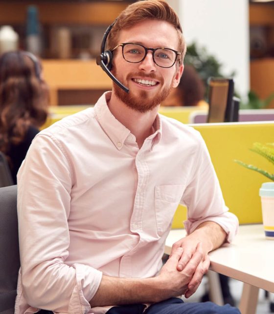portrait-of-businessman-wearing-headset-talking-to-2021-12-09-06-50-58-utc-1-e1660552878282.jpg